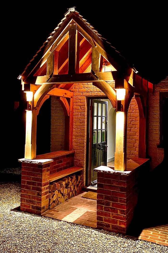 Engraved porch, oak porch, oak porch with seats, entrance porch, pretty porch in the evening, porch log storage
