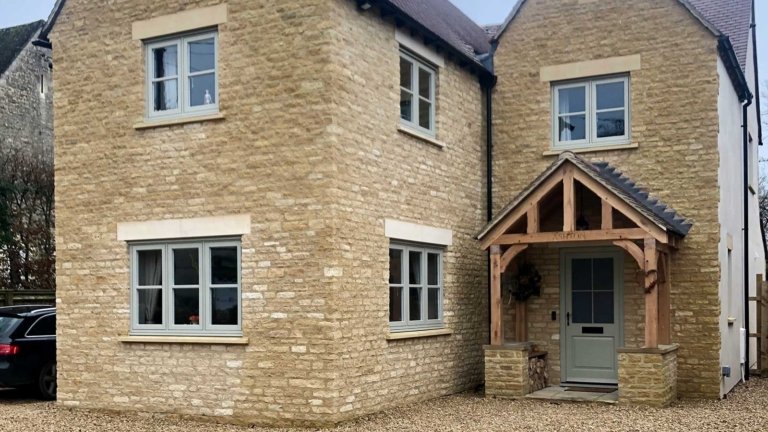 Oak Porch with 6 Curved Brackets, Porch with oak seats, Engraved Porch, Cotswold Porch