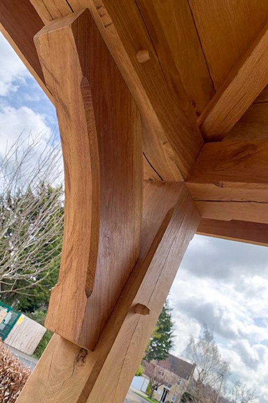 Oak hipped porch curved brackets