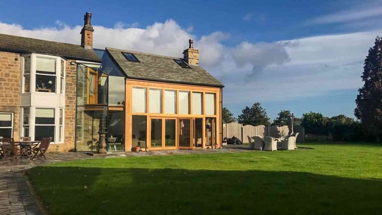 oak frame extension with bi-fold doors and glass