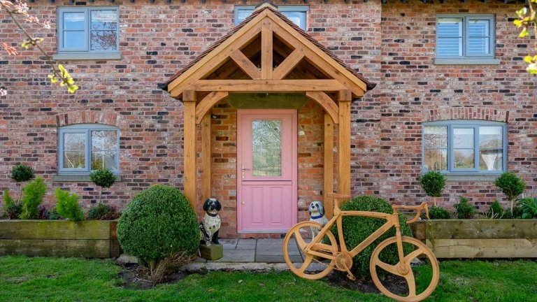 oak porch, oak porch on a porch, pink door, front porch, oak entrance porch, oak bike